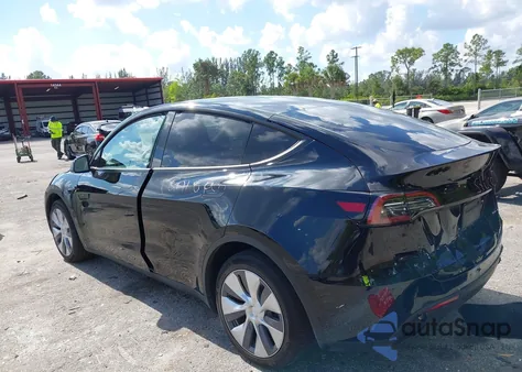 2023 Tesla Model Y Awd/Long Range Dual Motor All-Wheel Drive z USA, uszkodzony, nr VIN 7SAYGDEE3PF928281